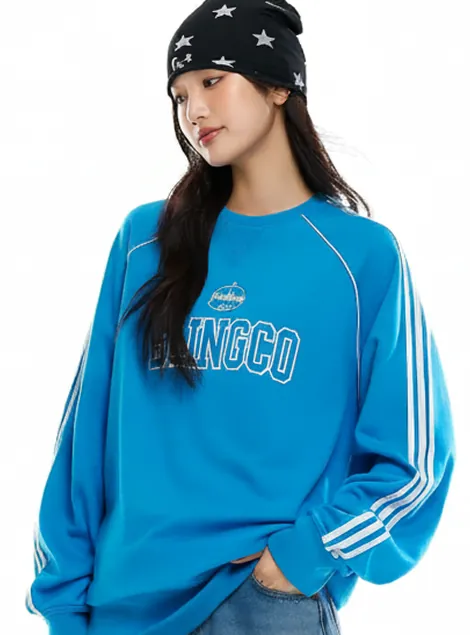 BLINGCO 레터링의 블루 라글란 스웨트셔츠